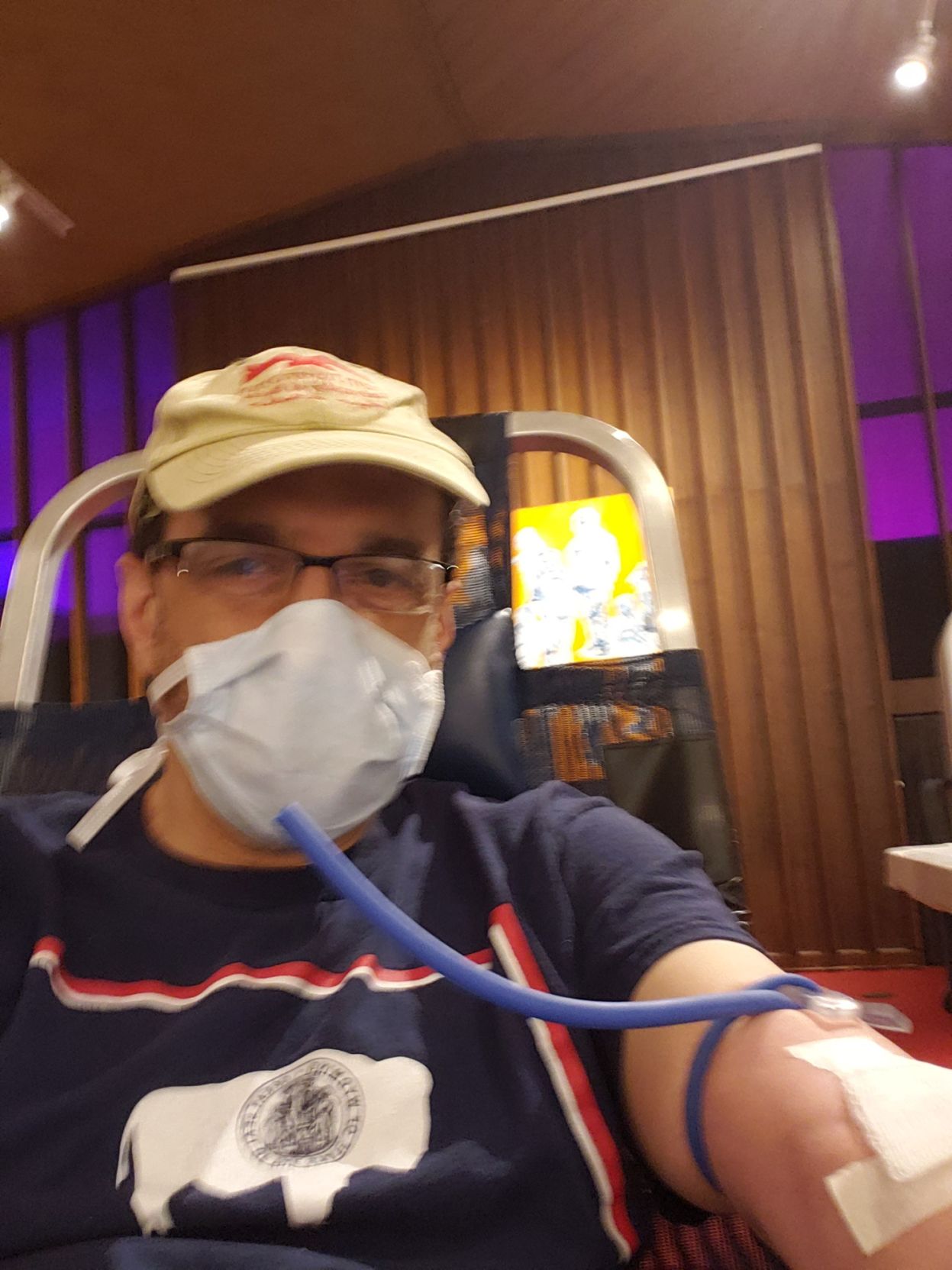 Dan Grossman donating blood at the Harrison Center's Speck Gallery